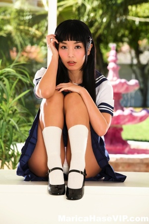 Japanese schoolgirl showing off her tiny - Picture 1