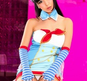 Anime-like Asian brunette with bangs shows her hairy pussy