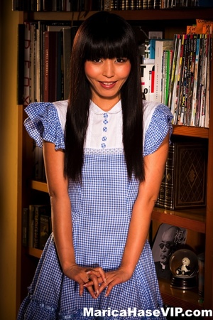 Blue get-up Asian brunette reading books and getting naked - Picture 1