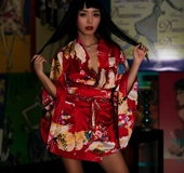 Red get-up Asian with stripper heels shows off her pussy