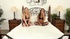 Tanned brunette in fishnets fucking her girlfriend on a bed