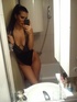 shades-wearing brunette takes off