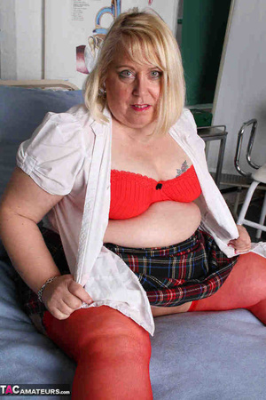 Blonde bbw in red stockings wiggles out of white shirt and plaid miniskirt to expose her pierced cunt in the hospital room - Picture 4