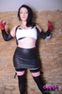 Squatting low, she takes his huge, ebony, shaft down her throat, relishing