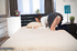 Slender Japanese schoolgirl strokes her accurate snatch