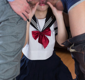 Two men are getting sucked by an angelic Asian schoolgirl