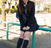 Toned Asian cutie shows off her naked round bottom