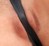 Blonde in black panties and stockings shows her pussy