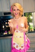 pink-loving cheerful blonde cook