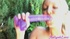 Tiny tits blonde fucks her pussy with a purple dildo