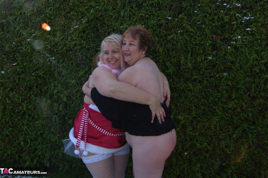 Two mature ladies in high heels and sexy lingerie undressing outdoors and posing naked on the show - XXXonXXX - Pic 14