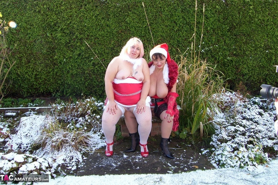 Two mature ladies in high heels and sexy lingerie undressing outdoors and posing naked on the show - XXXonXXX - Pic 18