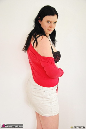 Black haired gf sheds red top and white miniskirt before taking off tight lingerie by the white wall - XXXonXXX - Pic 5