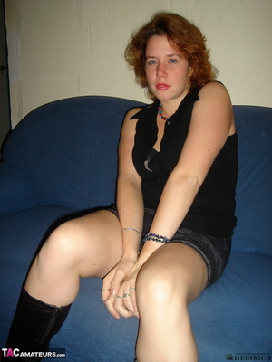 Big breasted redhead in leather boots sheds miniskirt and grey panty just to expose her shaved vagina - XXXonXXX - Pic 10