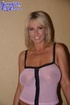 Lucious blonde wearing sheer pink top and thong gets her legs carried