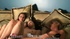 three topless lesbians talking