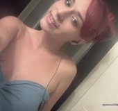 Redhead flips him off and shows him her beautiful naked tits