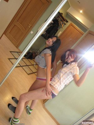 Brunette teen and a redhead enjoys grinding their asses while taking pics. - Picture 3