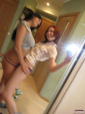 Brunette teen and a redhead enjoys grinding their asses while taking pics. - Picture 7