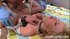 Bound, with her legs tied open, this blonde moans as he rams into her
