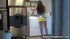 Hanging out in the laundry mat, this tramp in a short skirt, flaunts her