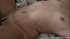 Blindfolded, with a neatly trimmed cunt on display, with her mouth agape