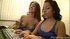 Straddling her friends' waist, this brunette, puts a smile on her face