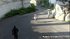 Walking, aimlessly, in the park, this tramp in a white dress struts her