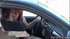 Hooking up in a car, this redhead makes out before mounting her man, taking