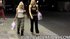 Two busty blondes saunter around town, going from store to store, being