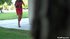 Flaunting her sexy body, in high heels and a short skirt, she struts around