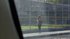 Walking around, she's oblivious to the fact that she's being stalked