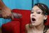 A slut with braces smiles as she gets her face drenched in a torrent of